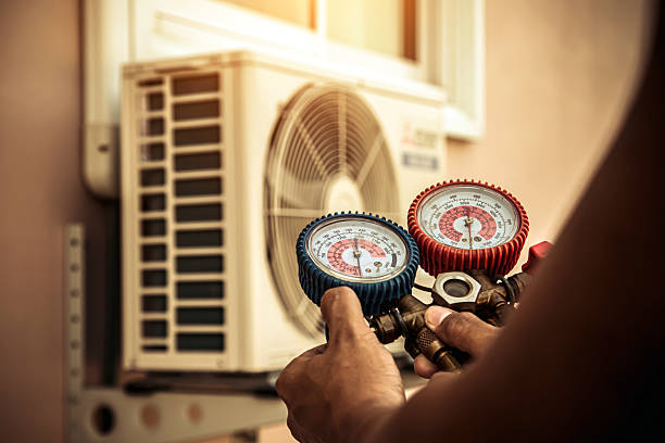 Professional Air Conditioning Service technician working in Pflugerville, TX